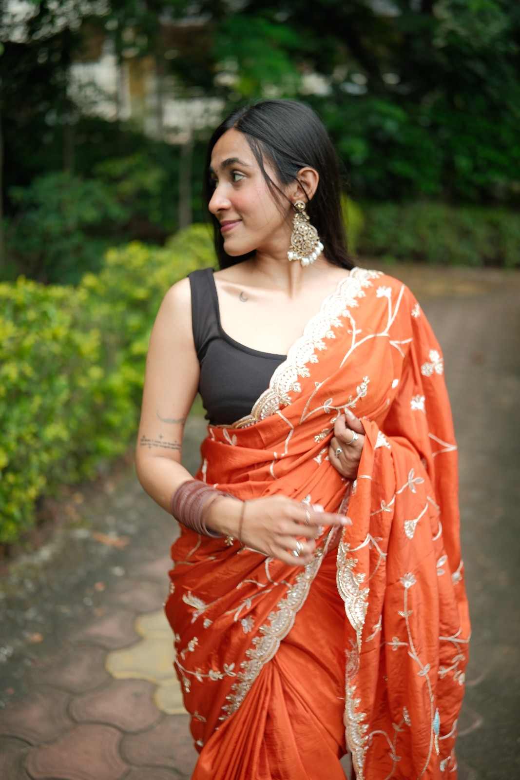 Gulnaar Orange Embroidered Saree