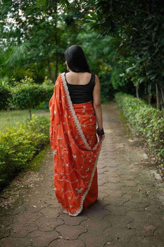 Gulnaar Orange Embroidered Saree