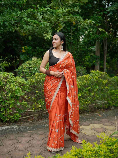 Gulnaar Orange Embroidered Saree