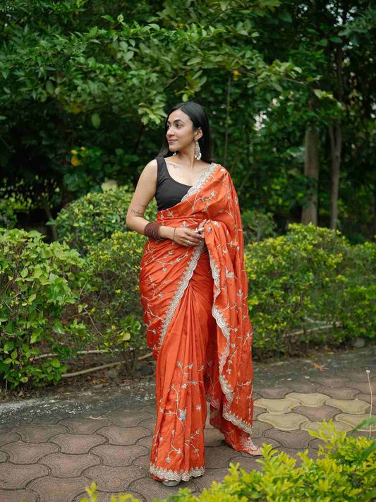 Gulnaar Orange Embroidered Saree